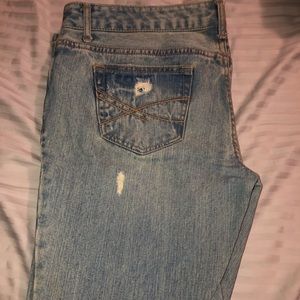 Distressed boot cut jeans